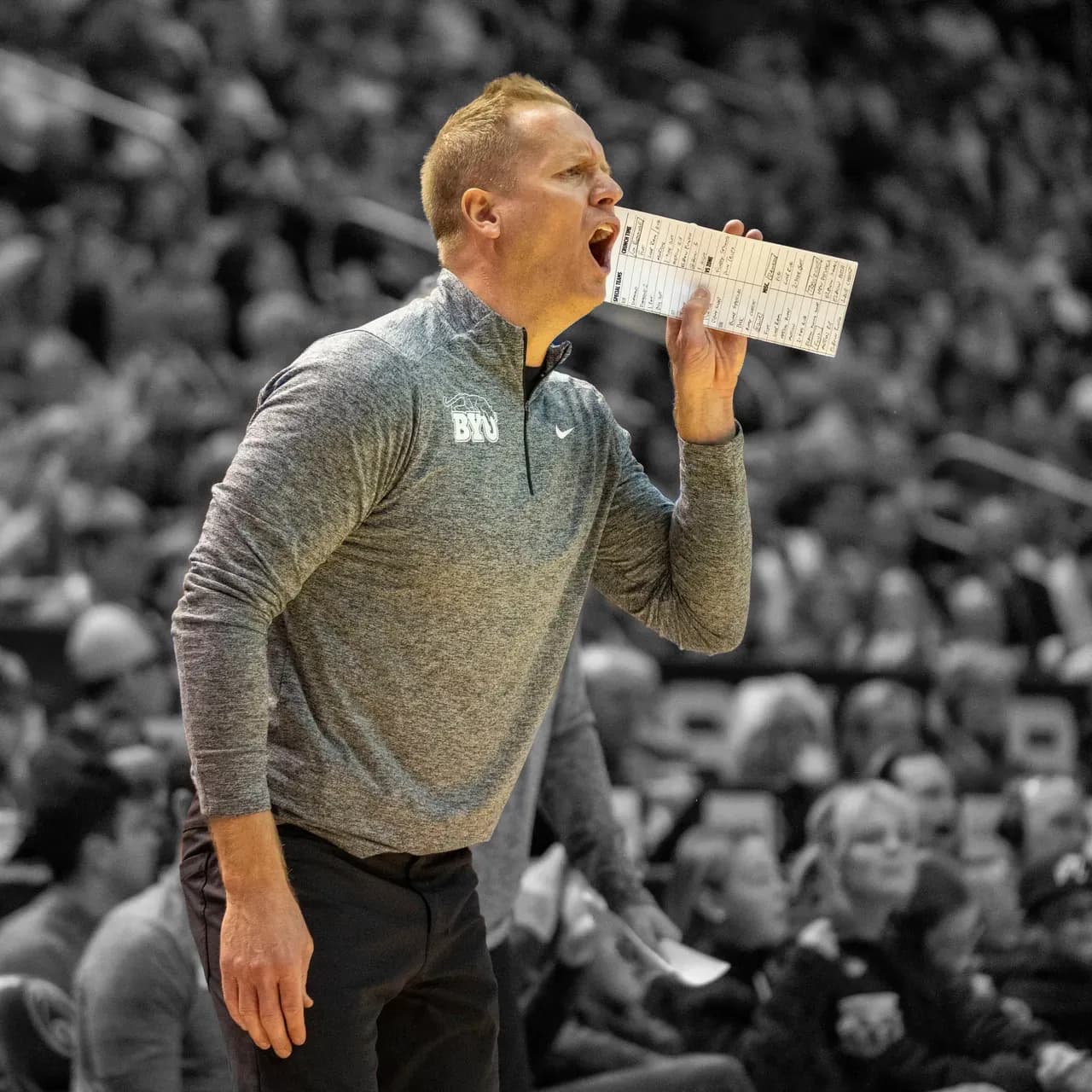 Kevin Young coaching at a BYU game